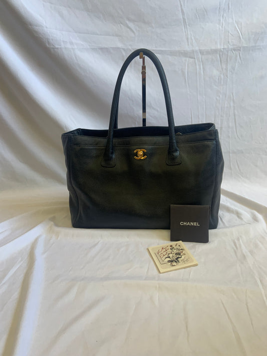 chanel executive black tote front_ the guilty woman