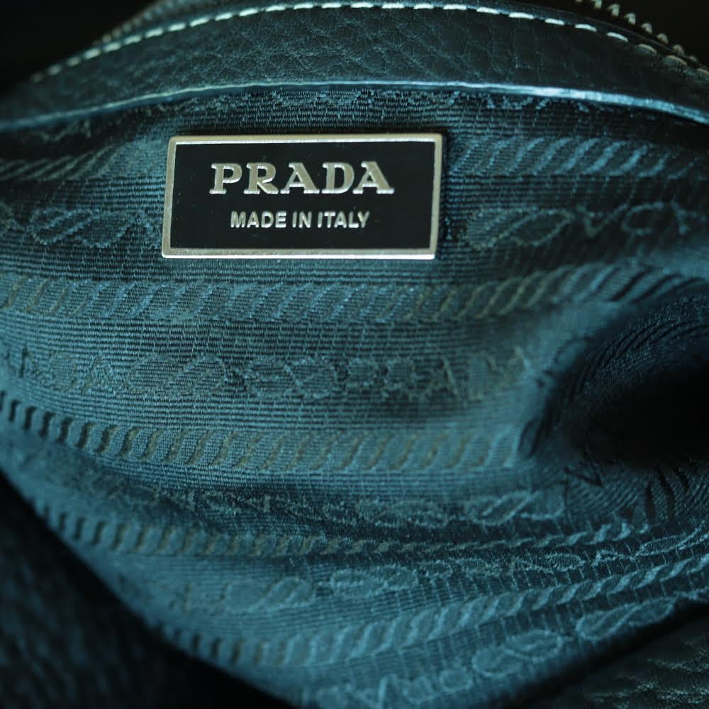 prada leather bag logo_ The Guilty Woman